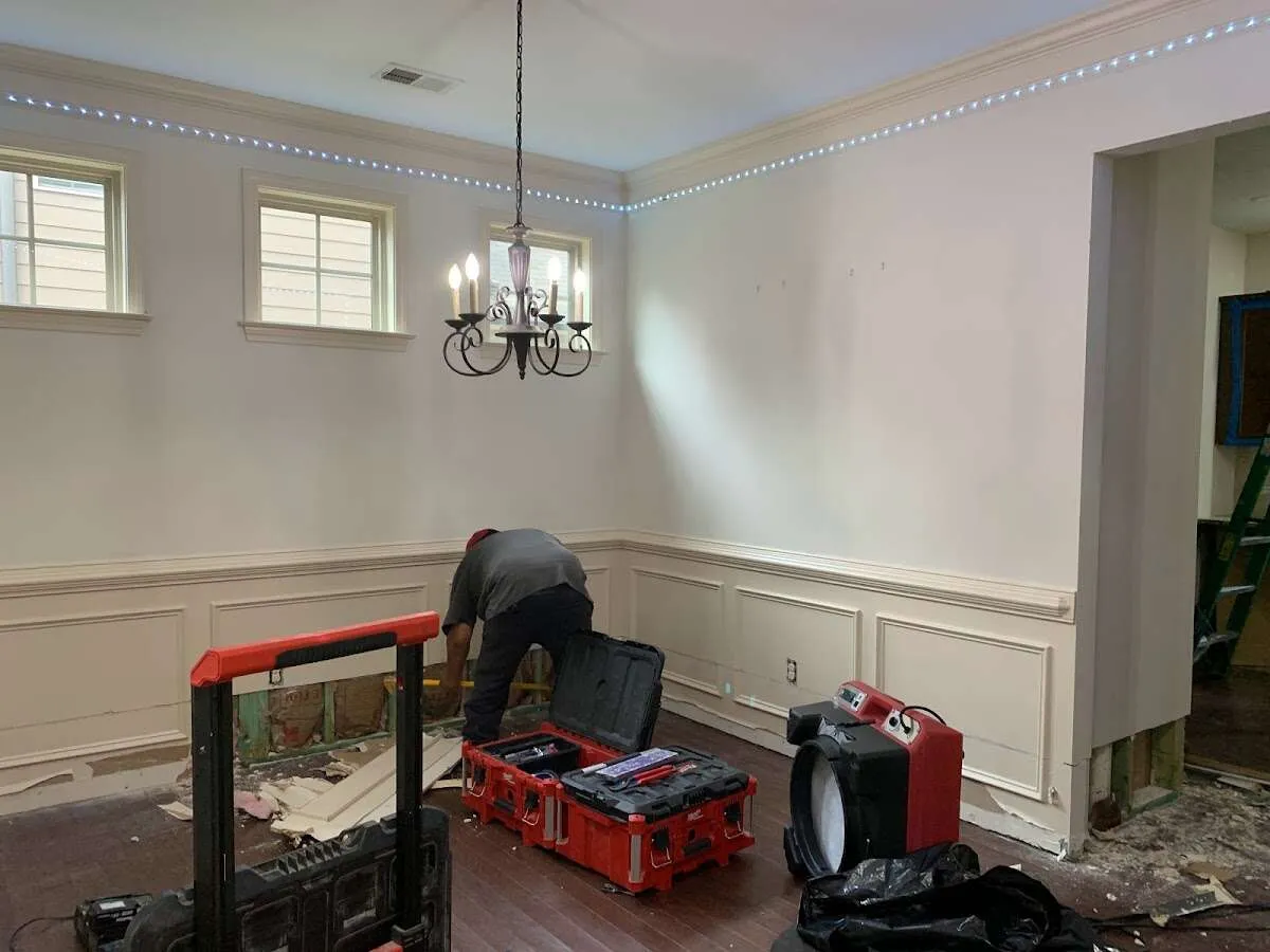 Restoration technician with professional equipment in Parkland